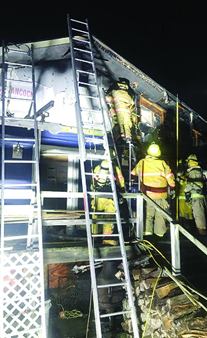 Firefighters Save Two Homes