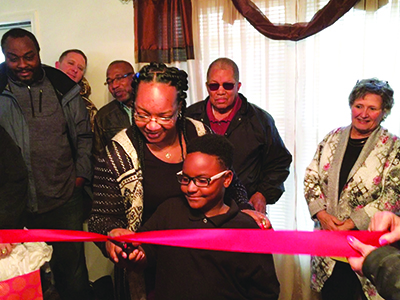 Family Cuts Ribbon on New Habitat Home