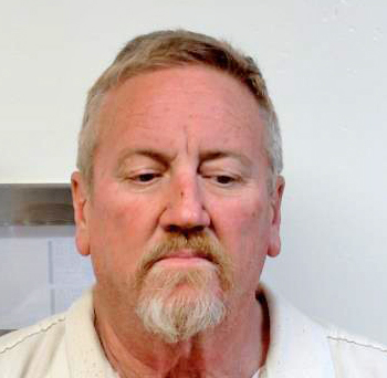Teacher Arrested for Having Guns at School
