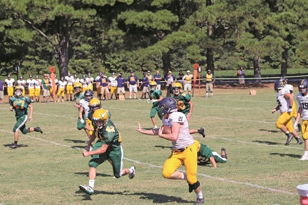 Trojans Gain Victory, 55-16