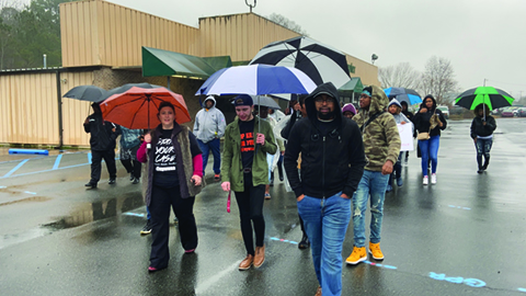 Protesters Rally Against Violence in Community